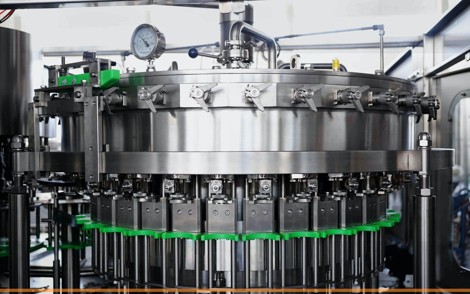 Real stainless steel beverage filling machine detail for Allot Tech projects
